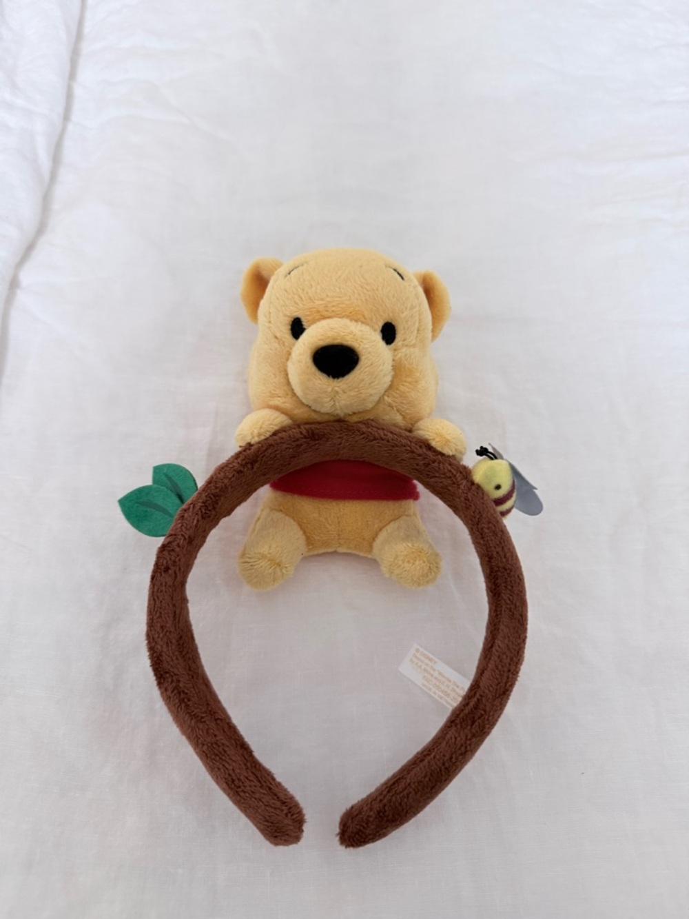 Tokyo Disney Pooh Plush Headband with Brown Band and Green Leaf Accent